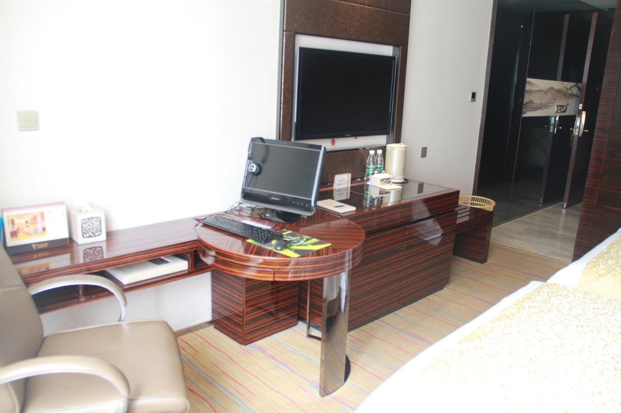 Huangjingang Holiday Hotel Jiexiu Room photo