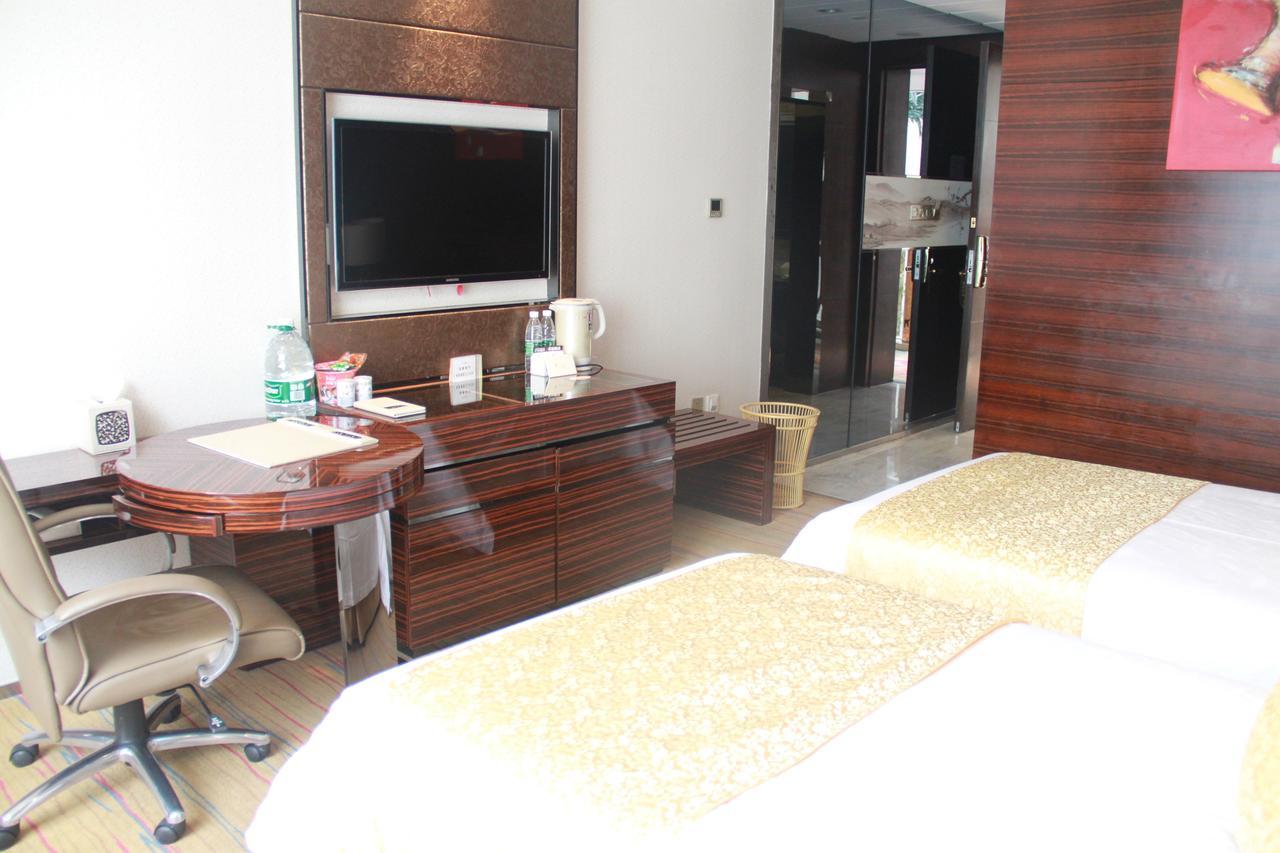 Huangjingang Holiday Hotel Jiexiu Room photo